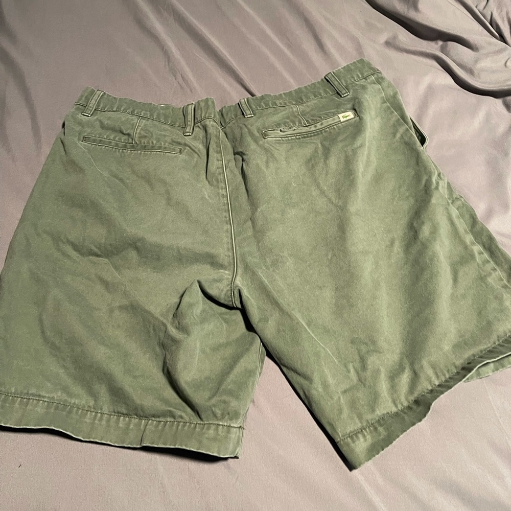 Lacoste shorts size 40, green in color.